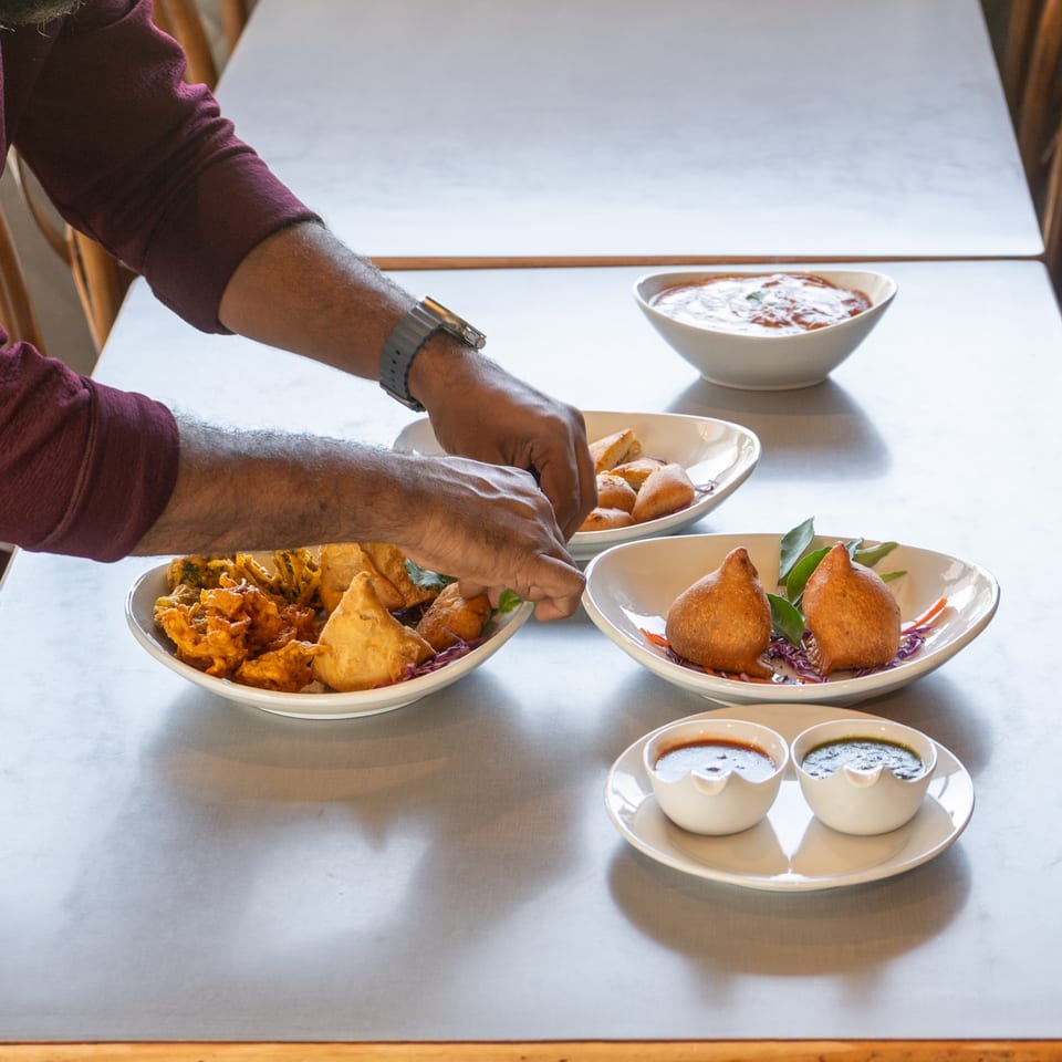 Appetizers being arranged at Indian Masala