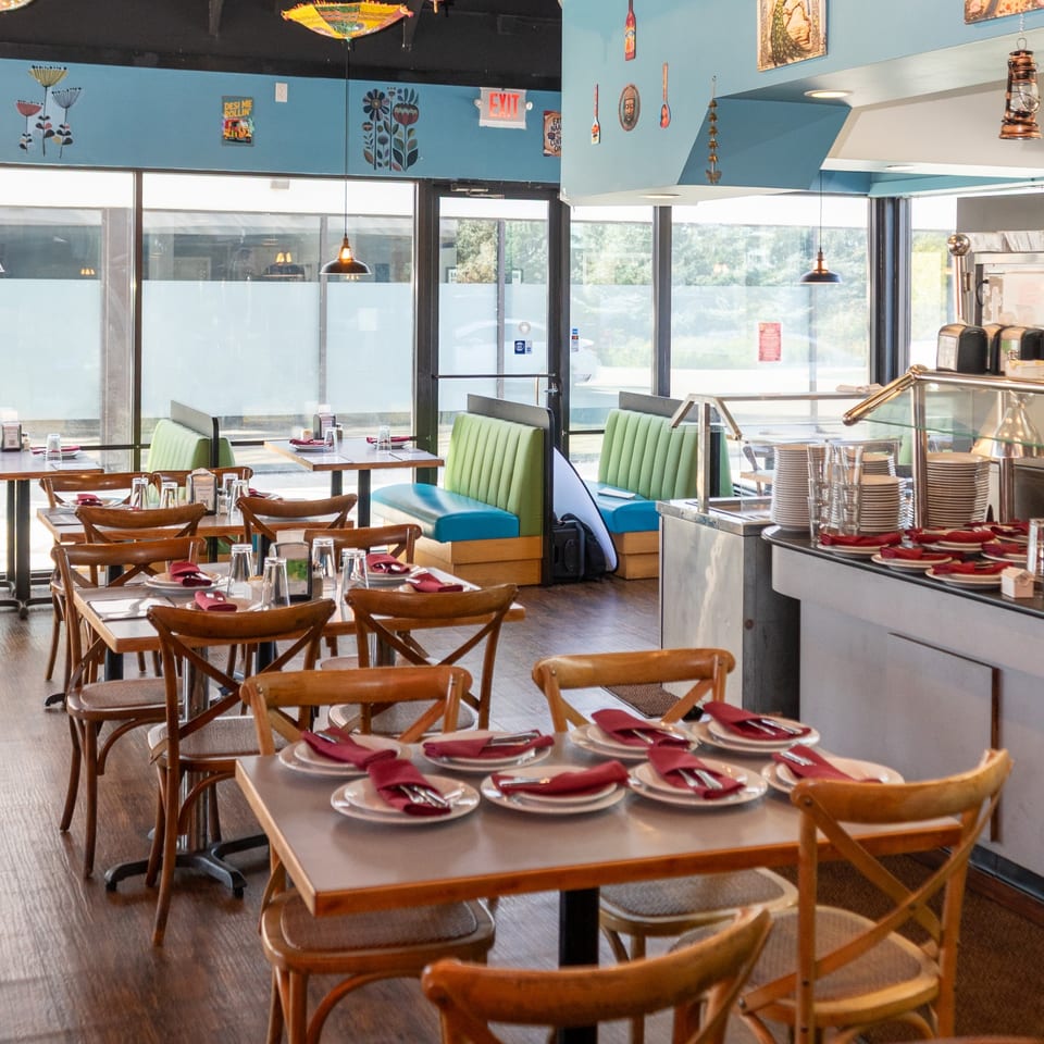 Dining tables and booths at Indian Masala